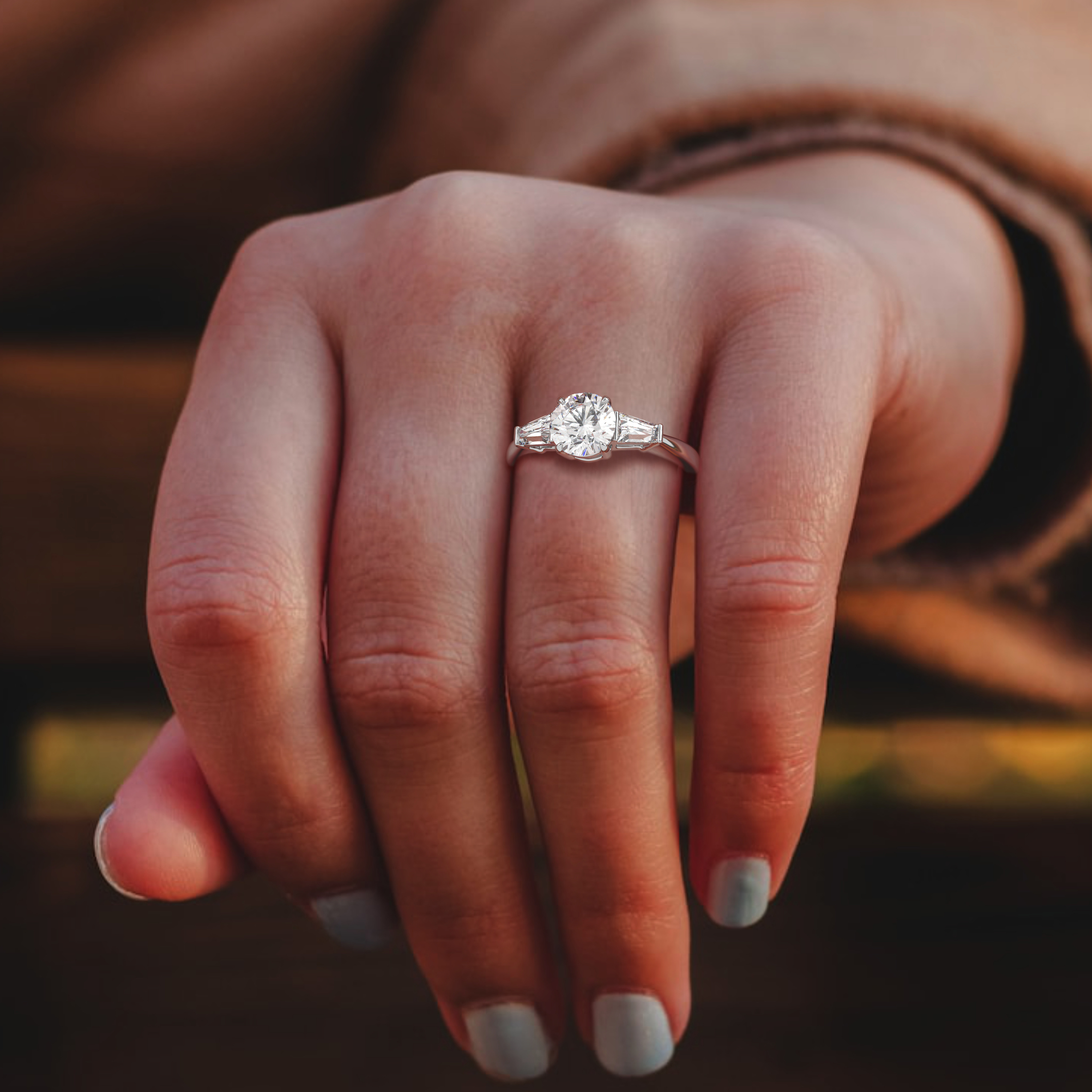 18k white gold  round & baguette cut 3 stone diamond engagement ring