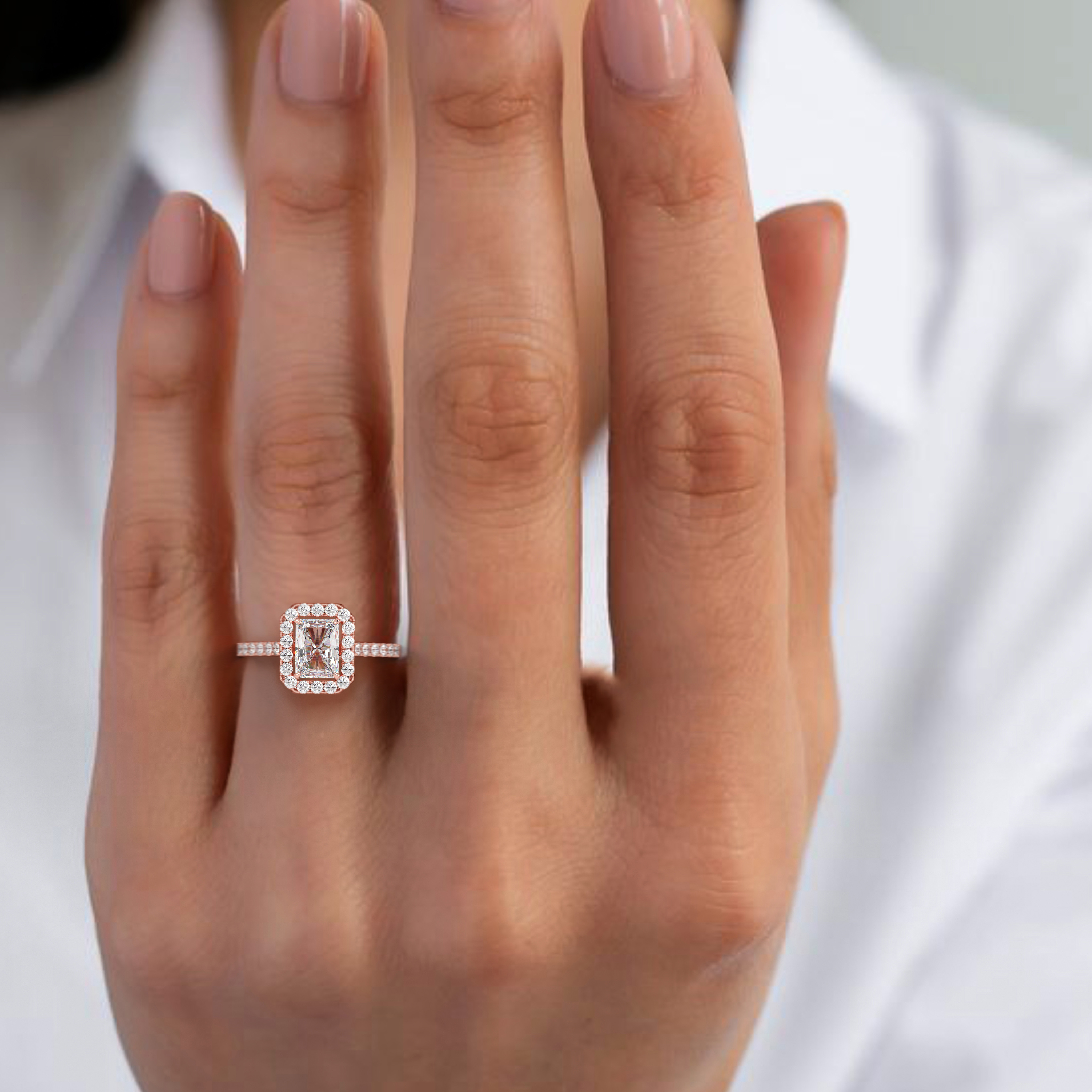 18k rose gold  radiant cut halo style diamond engagement ring with pave band